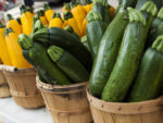 Fresh Summer Squash in Baskets at Farmer's Market