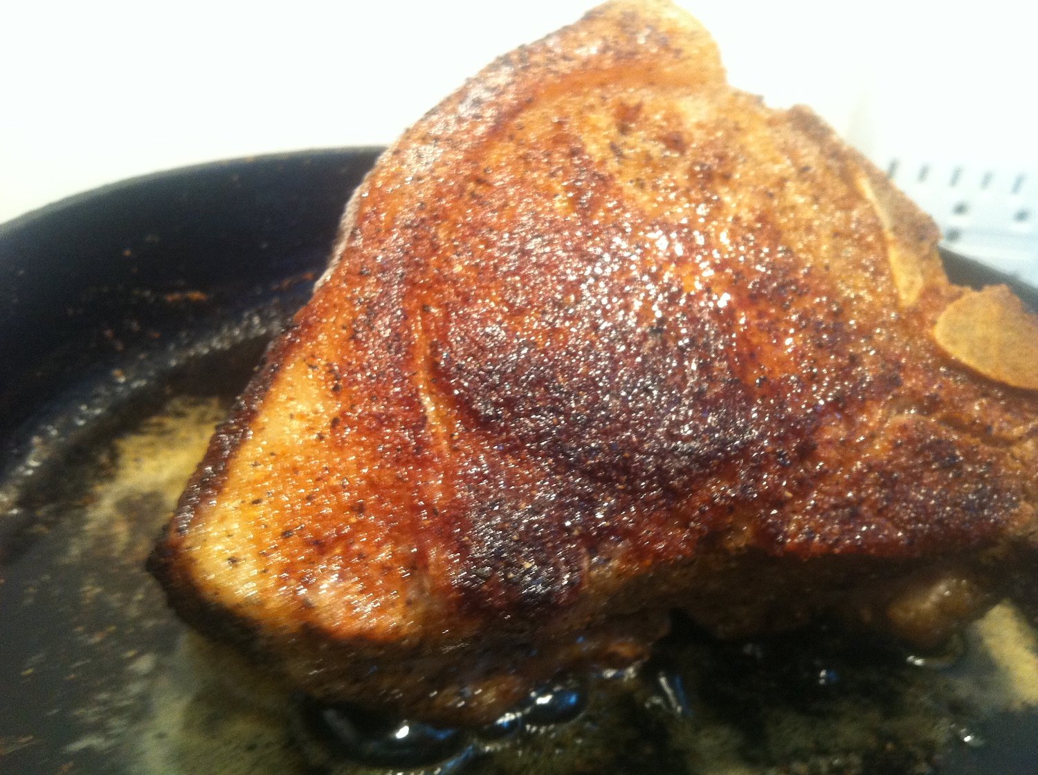 Frying a Pork Chop in Iron Skillet