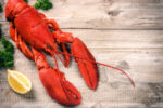 Fresh lobster on wooden table