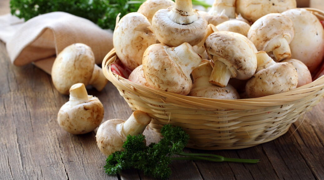 White Mushrooms in Wicker Basket