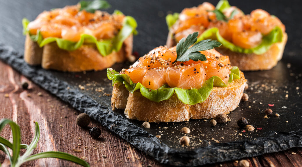 Toasted canapes with salmon