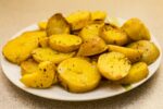 a plate of fried potatoes