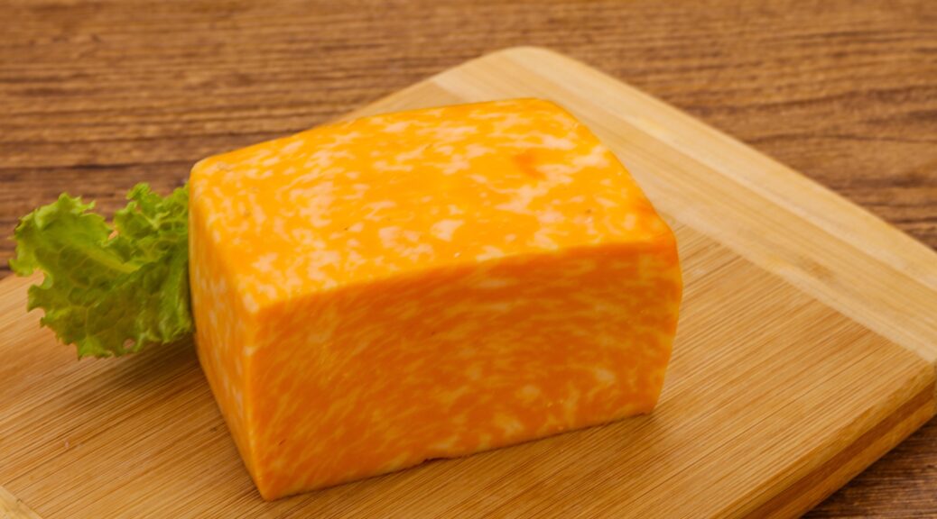 homemade brick cheese on cutting board